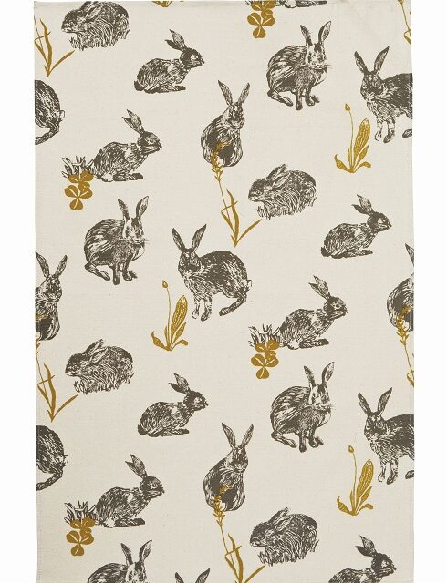 block print rabbit tea towel with animals in black against a cream background