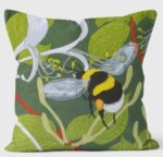 bumble bees cushion showing a bee against a green background