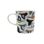 white ceramic mug with stylised birds flying on it