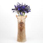 camel vase by quail ceramics shows the warm brown camel vase with blue flowers in