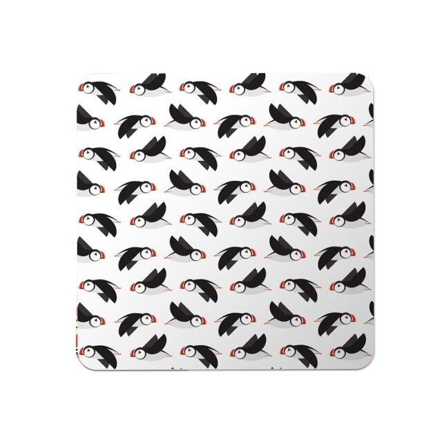 puffin circus placemats shows stylised black and white puffins