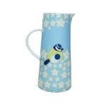 Tall blue jug with blue and yellow bird and white flowers