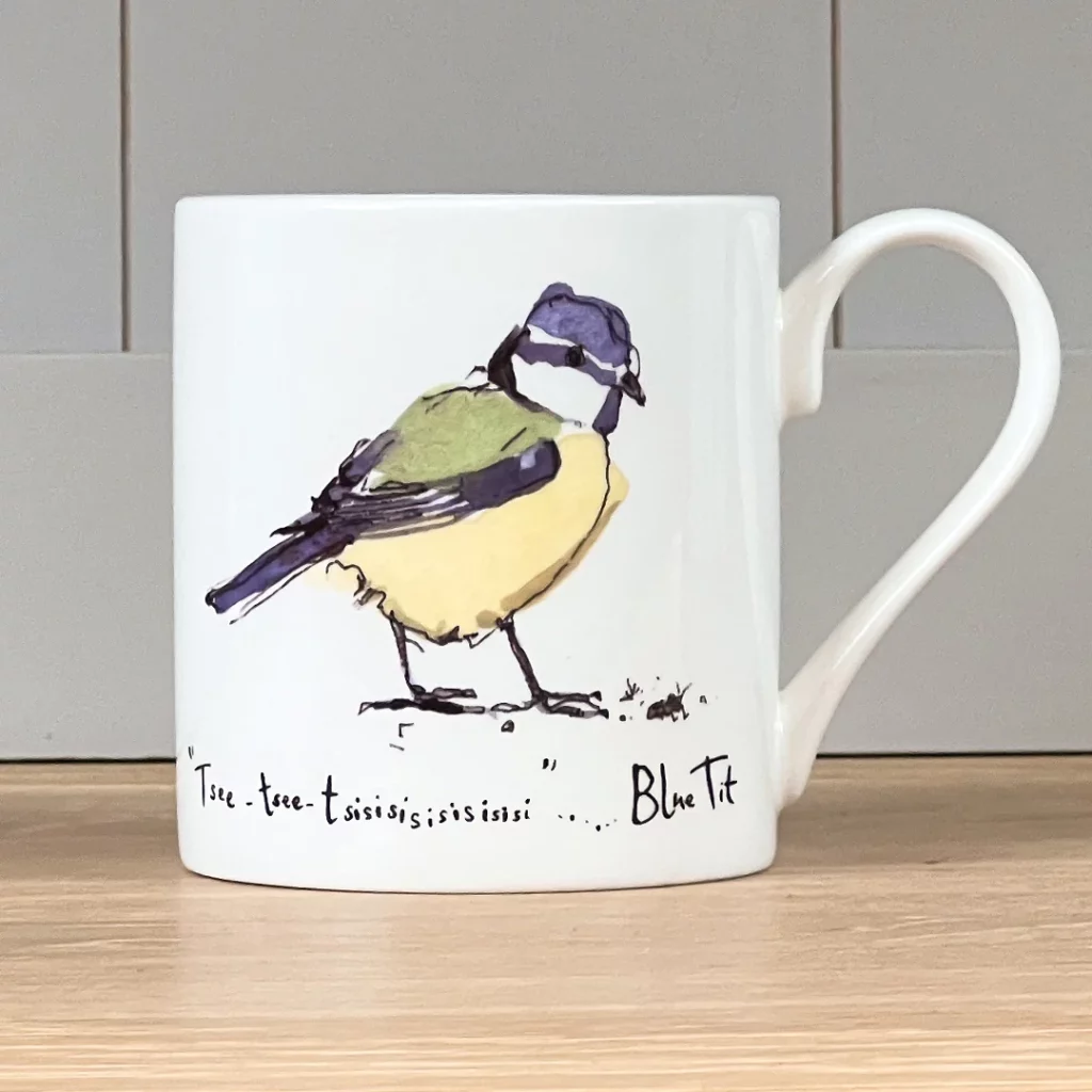 Coloured drawing of a blue tit on a white mug