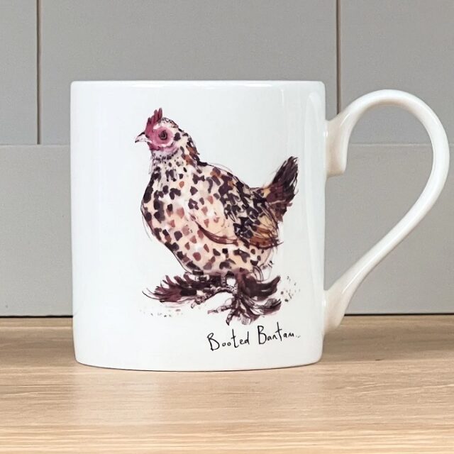 white mug with brown speckled bird booted bantam mug by madeleine floyd