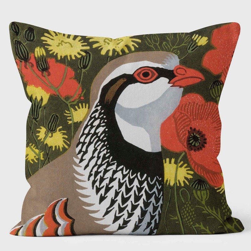 Partridge meadow cushion shows head of partridge against meadow with red poppies