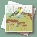 Green bird shown perched on seed head against a green background