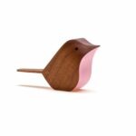 Small brown wooden ornament shaped like a bird with pink front Bird (Walnut Pink) by Jacob Pugh
