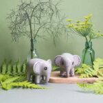 Small grey elephant salt and pepper shakers with green plants