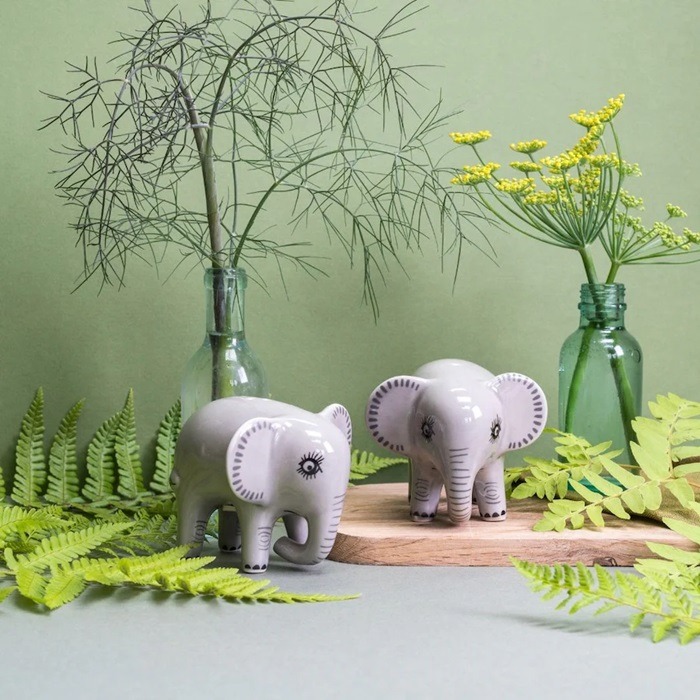Small grey elephant salt and pepper shakers with green plants