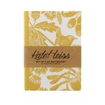 shows a yellow notebook - one of two a6 notebooks by kate heiss - with wren and oak leaves illustration and a card band around