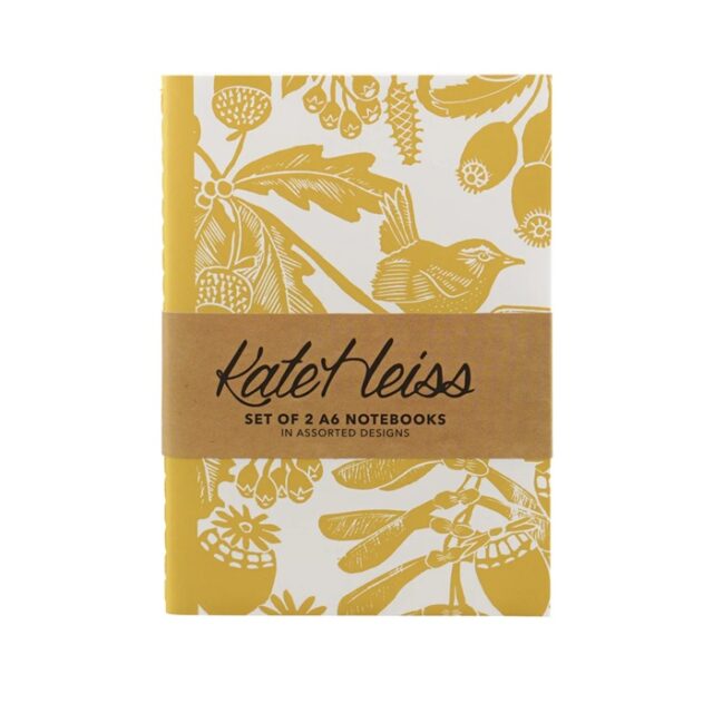 shows a yellow notebook - one of two a6 notebooks by kate heiss - with wren and oak leaves illustration and a card band around
