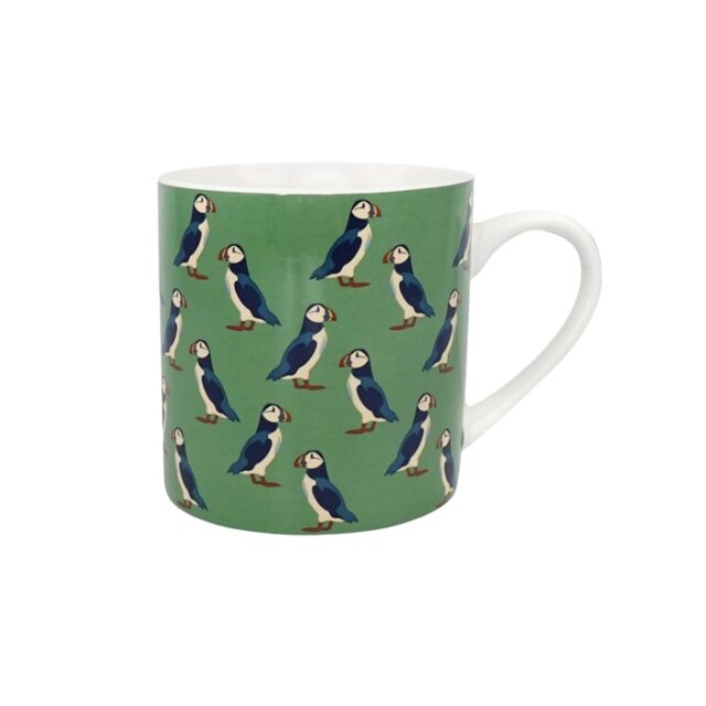 RSPB puffin mug shows the mug with a green background and small puffins on it in a repeat pattern