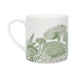 Woodland green mug by kate heiss is a white mug with green illustrations of a hedgehog and funghi