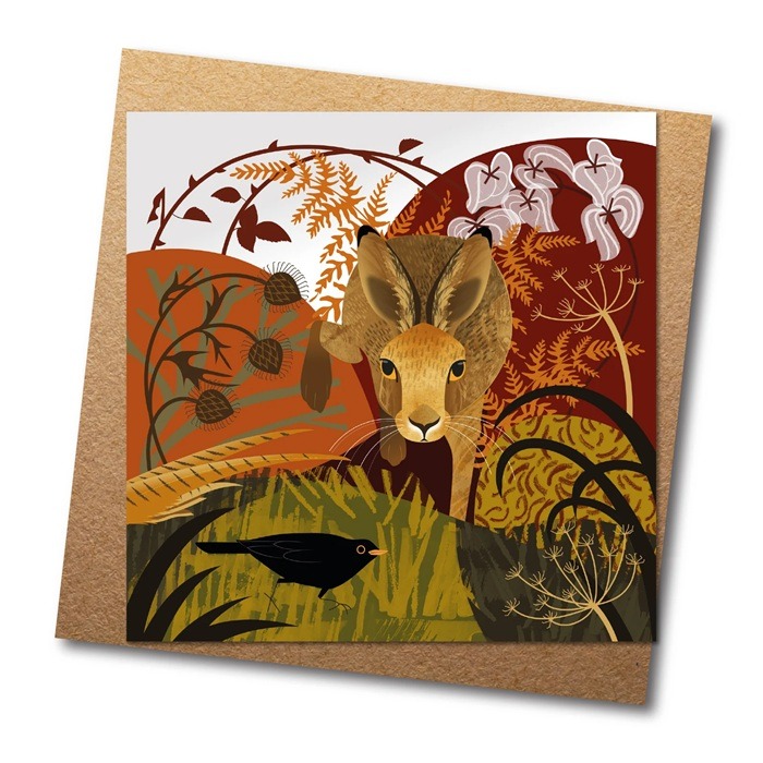 Hare and Hedgerow Greetings Card by Rachel Hudson shows a brown hare with a sytlised background of hedgerow and a blackbird in silhouette in the foreground