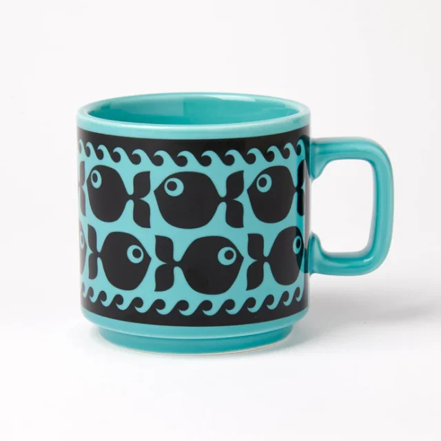 Hornsea Fish Mug in Teal by Magpie shows the blue mug with black fish designs