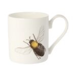 Bee mug by holly lasseter shows a black bee with golden thorax and translucent wings on a white mug
