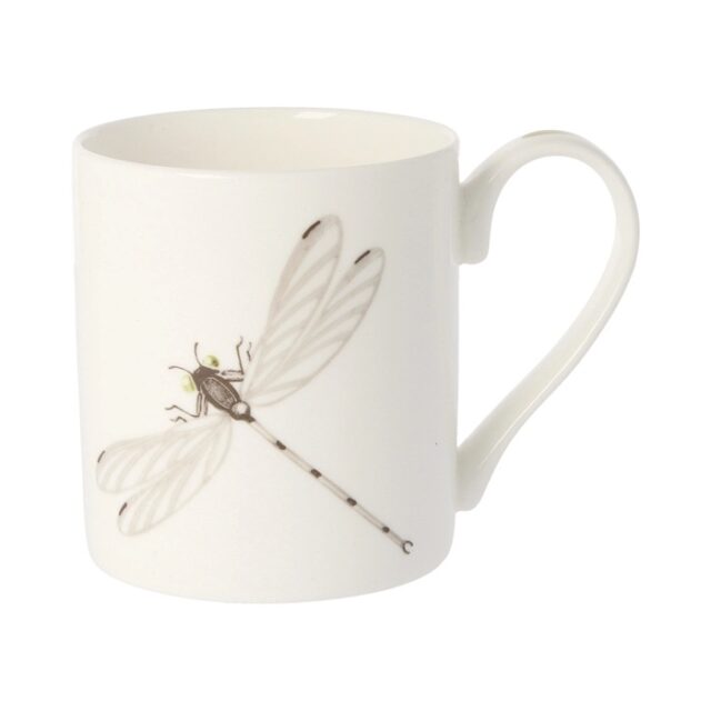 Dragonfly mug by holly lasseter shows a water colour drawing of a dragonfly in grey and black on a white mug