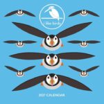 i like birds calendar 2027 shows stylised puffins in black against a blue background