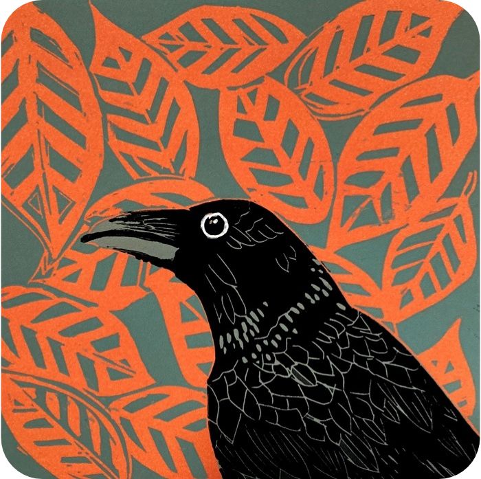 Little Crow Placemat by Sue Welfare shows a black bird with long beak and beady eye against a background of red leaves