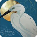 Little Egret Placemat by Sue Welfare shows a white bird with long black beak against a huge golden moon on an ultramarine blue background