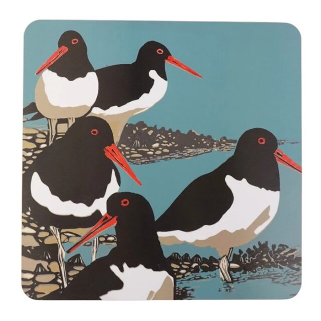 Oystercatchers Placemat by Sue Welfare shows five black and white birds with red bills on a sea shore