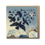 Flock of Crows Greetings Card shows a flock of dark coloured birds flying over roof tops and trees